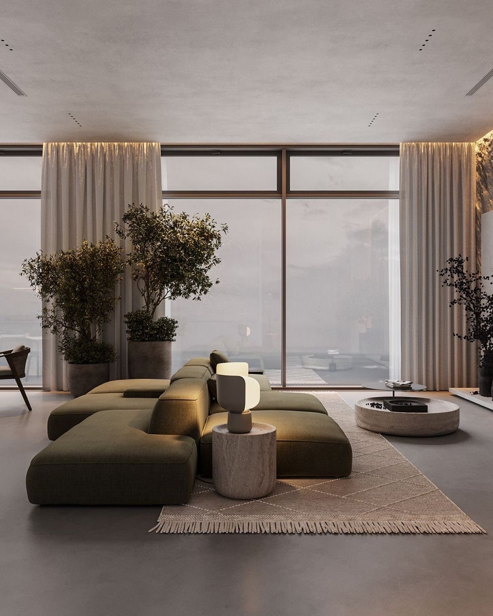 Editorial living space with curved green seating